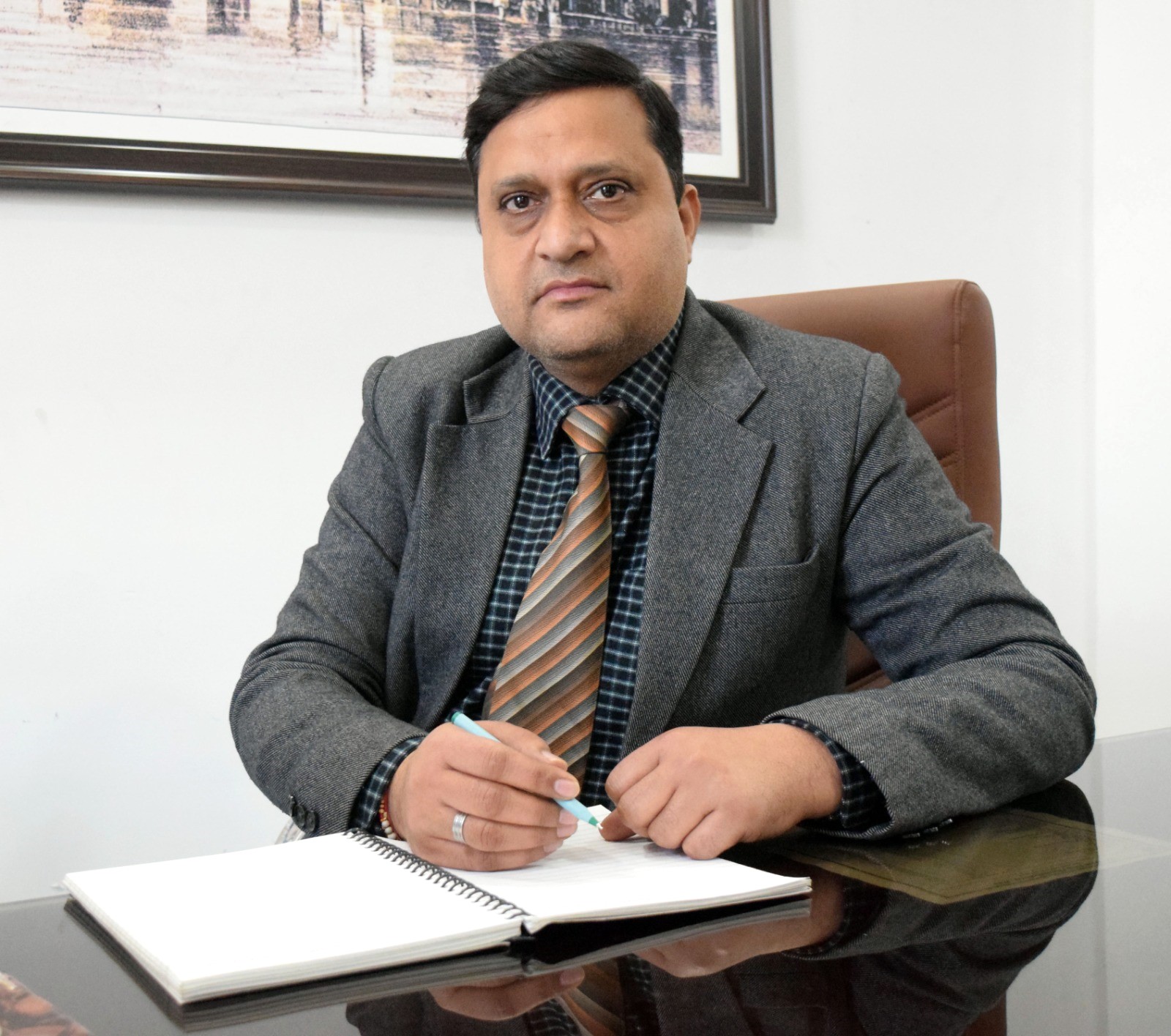 Principal, Kamkus College of Law