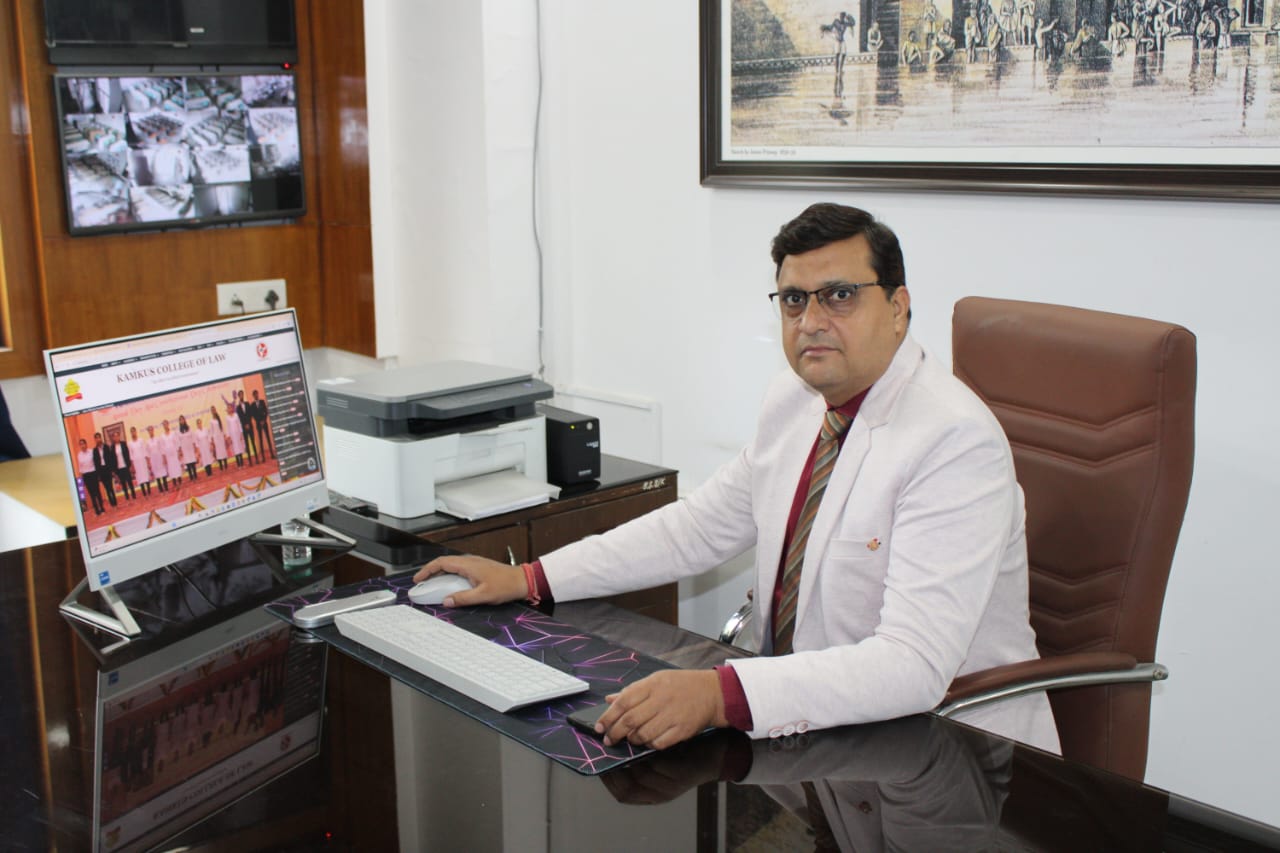 Principal Ambuj Sharma